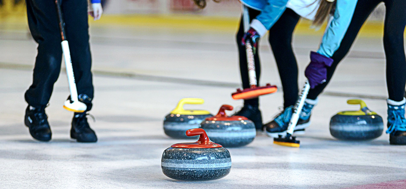 photo of curling rocks